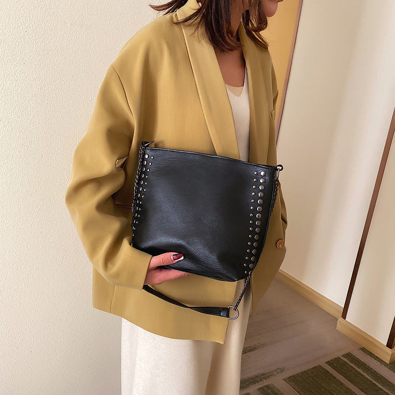 Winter new female bag retro style large capacity one-shoulder bucket bag soft leather rivet messenger bag